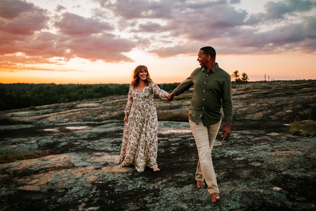 husband and wife holding hands
