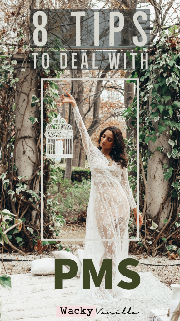 woman in white dress holding birdcage