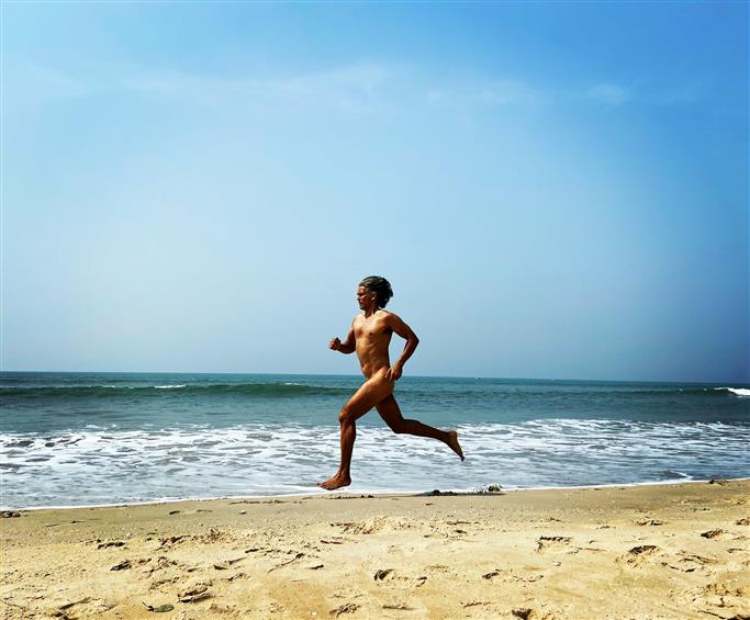 Milind Soman 55th birthday picture on the beach